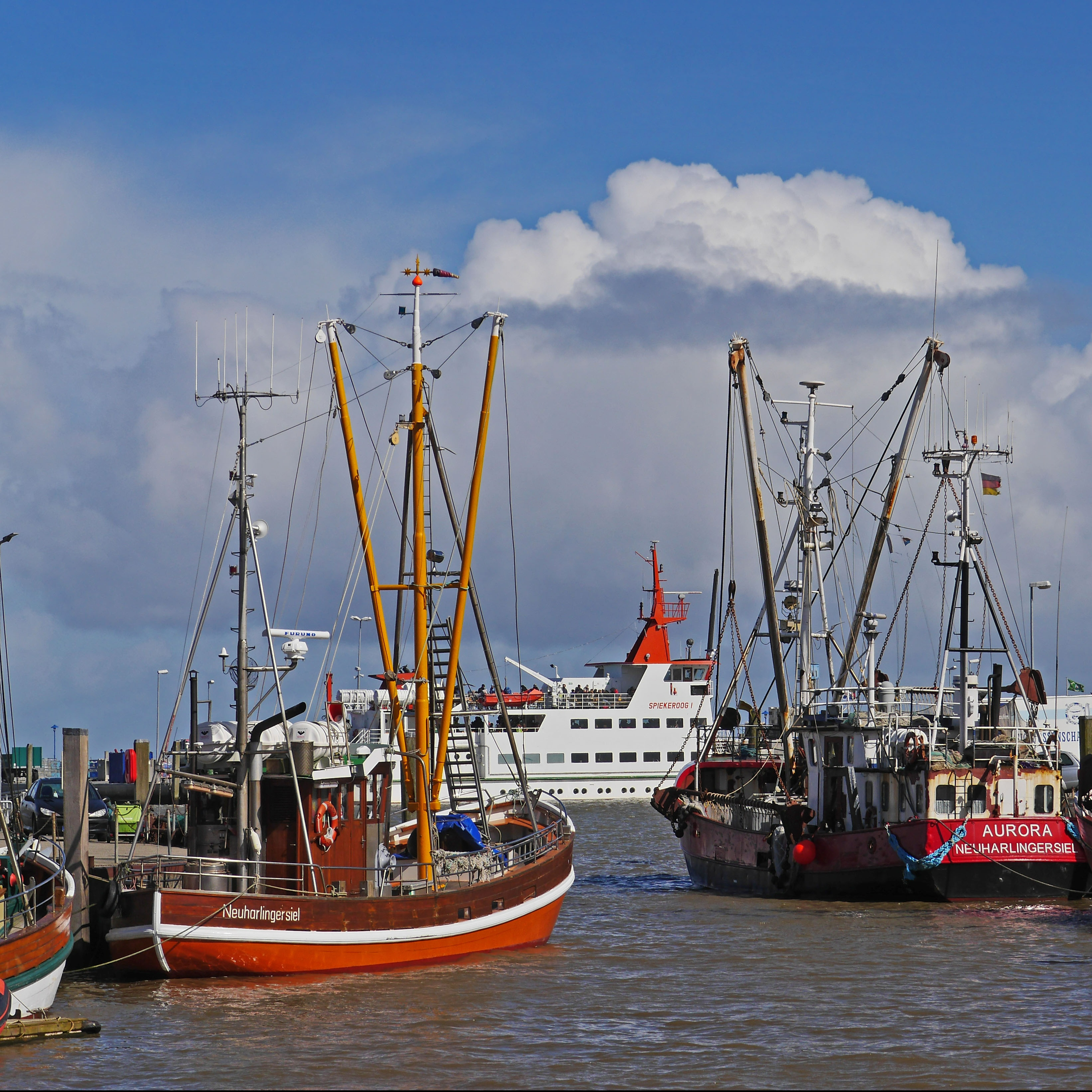 Fishing boats and ferry in the harbour